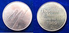 M&uuml;ntzer on an East German medal of 1989.